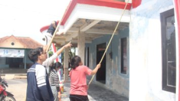Pengecatan Gedung Serbaguna Desa Gunung Tumpeng : Menyulap Wajah Baru untuk Fasilitas Umum